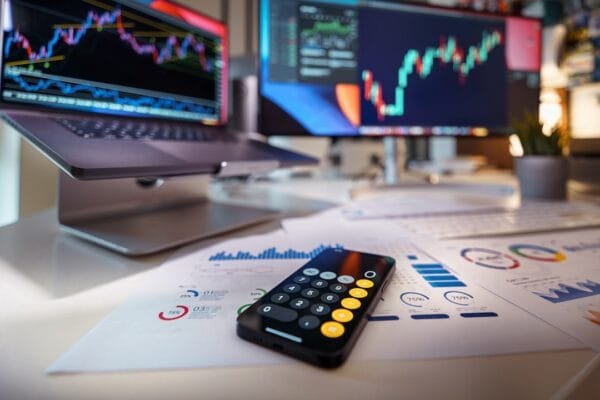 Financial charts and calculator representing securities market regulation