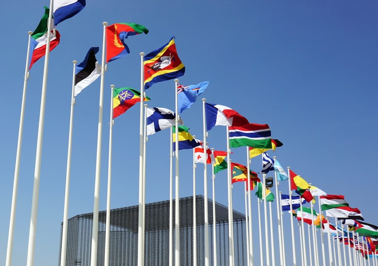 International summit diplomacy and global cooperation flags