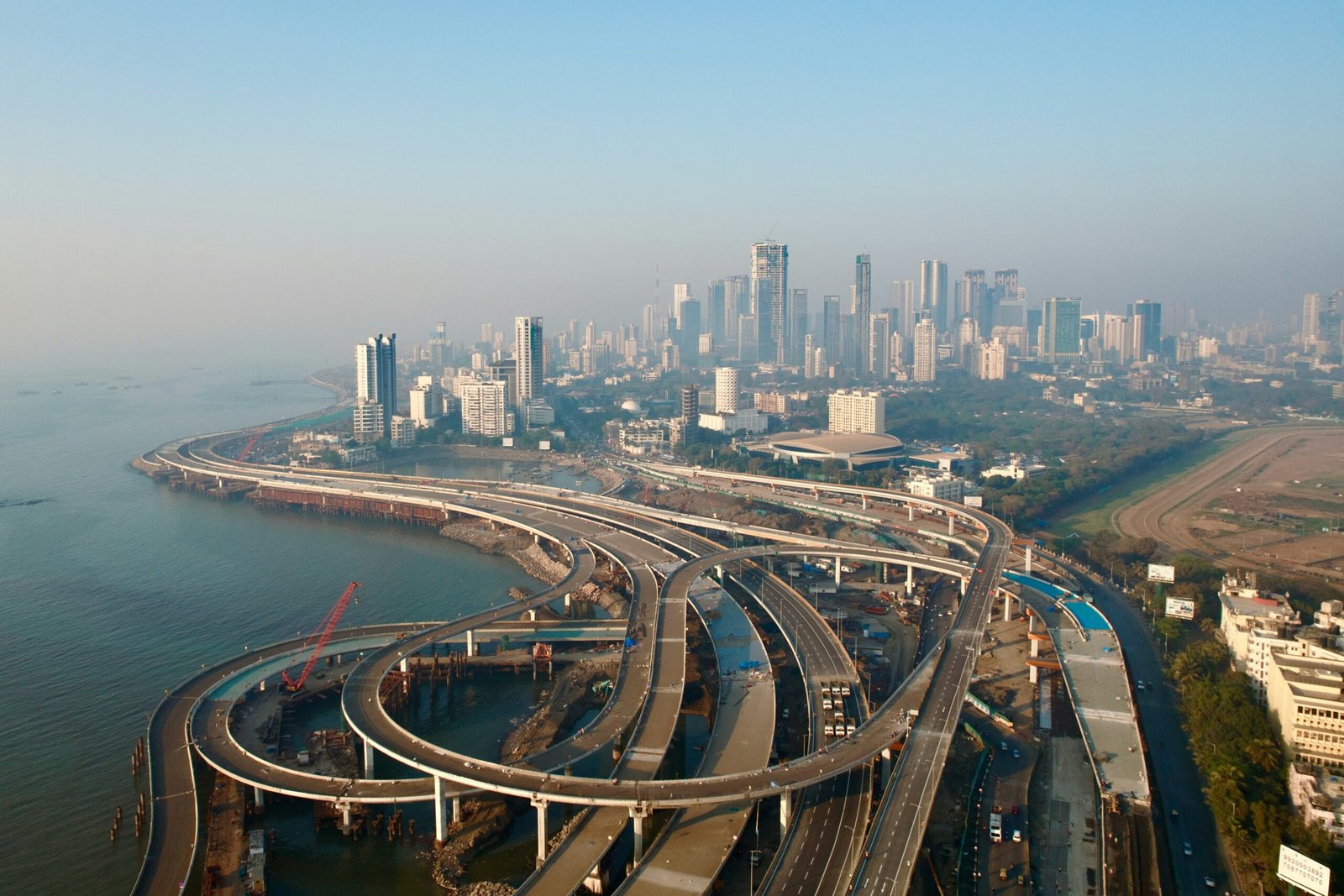 Elevated coastal road infrastructure in India, illustrating central infrastructure project monitoring