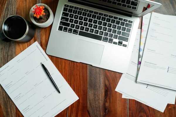 Laptop and paperwork on a desk; illustrative image for the UPSC September 2026 recruitment results guide