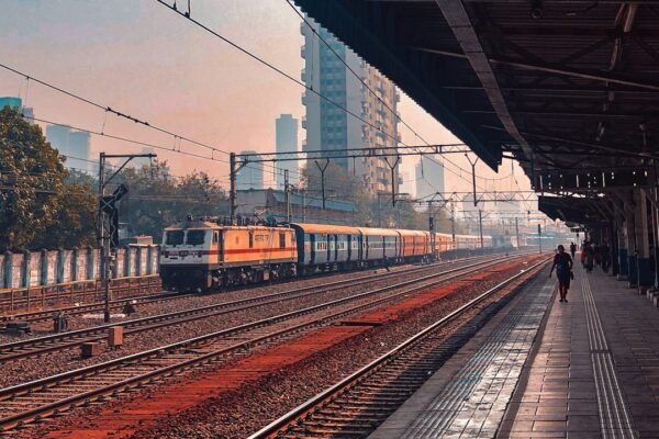 Illustrative railway train on tracks for RRB NTPC Graduate recruitment information
