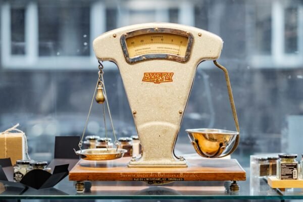 Precision weighing scale illustrating measurement accuracy and standards