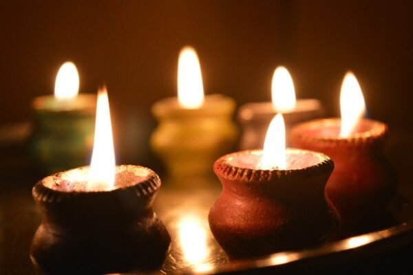 Traditional clay oil lamps lit for an eco-friendly, low-waste Diwali celebration
