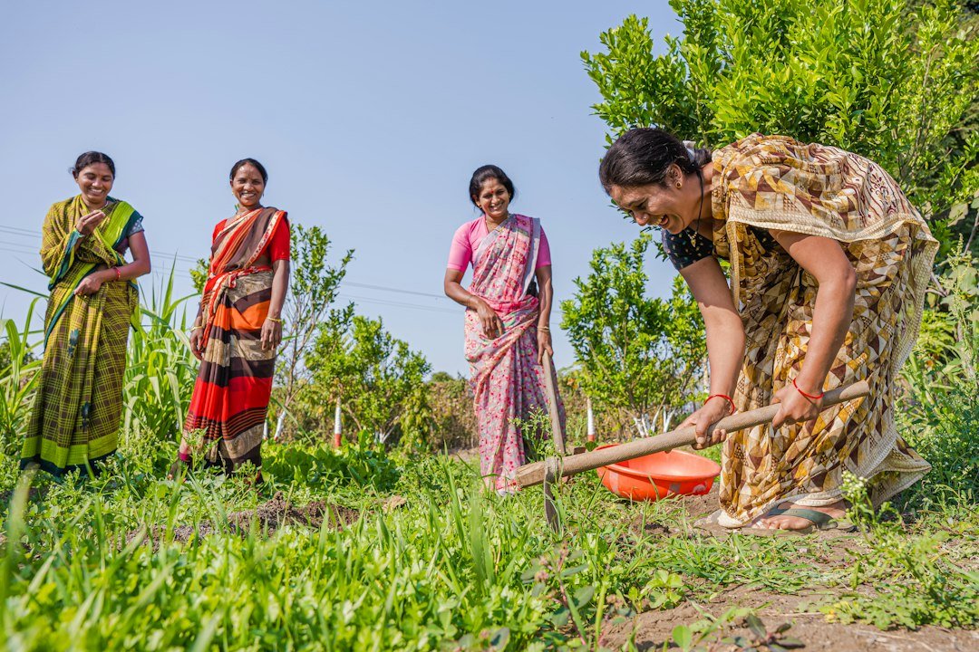 Women standing together outdoors, illustrative image for rural livelihoods